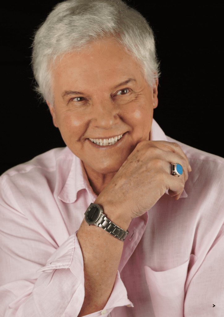 "Explore Jess Conrad's remarkable journey from wartime London to showbiz stardom in 'From Blitz to Glitz' - a captivating autobiography!" 🌟📚